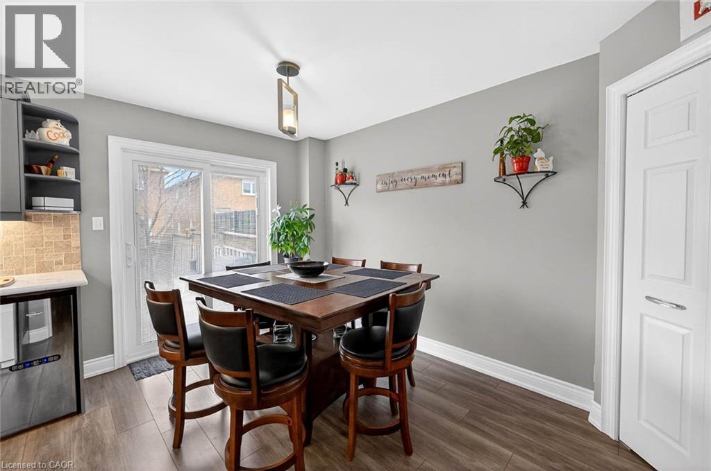 Dining space featuring baseboards and dark wood-type flooring - 3753 Densbury Drive, Mississauga, ON - Indoor Photo Showing Dining Room