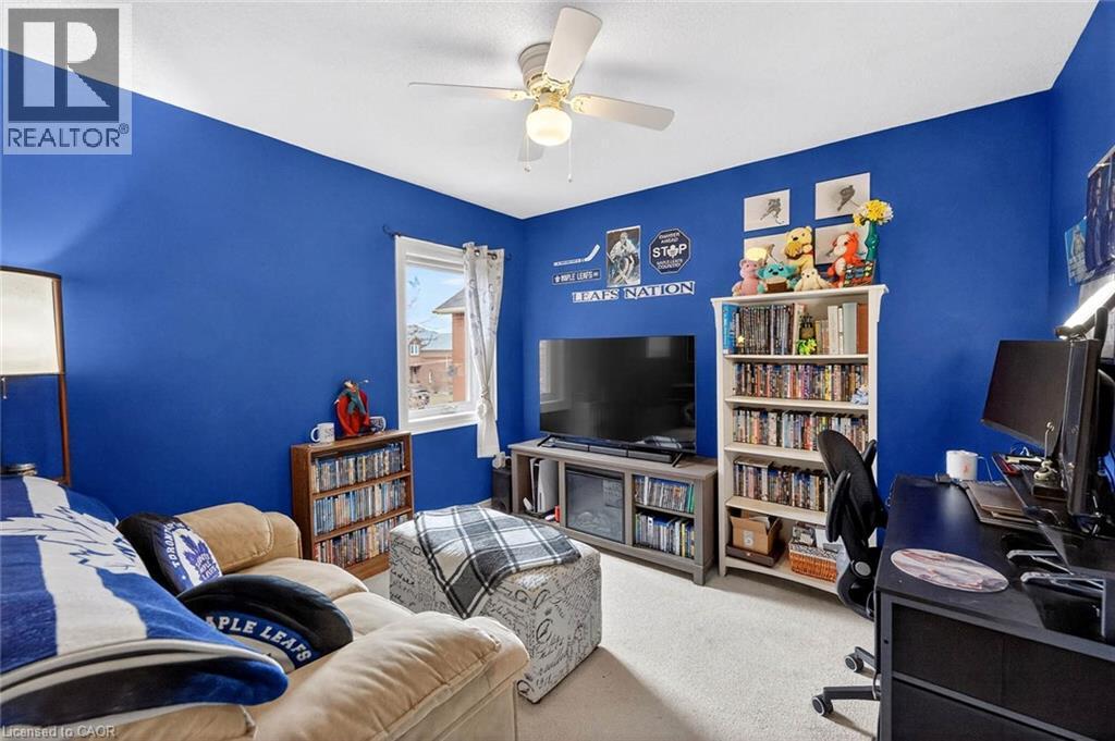 Carpeted living area featuring an office area and ceiling fan - 3753 Densbury Drive, Mississauga, ON - Indoor