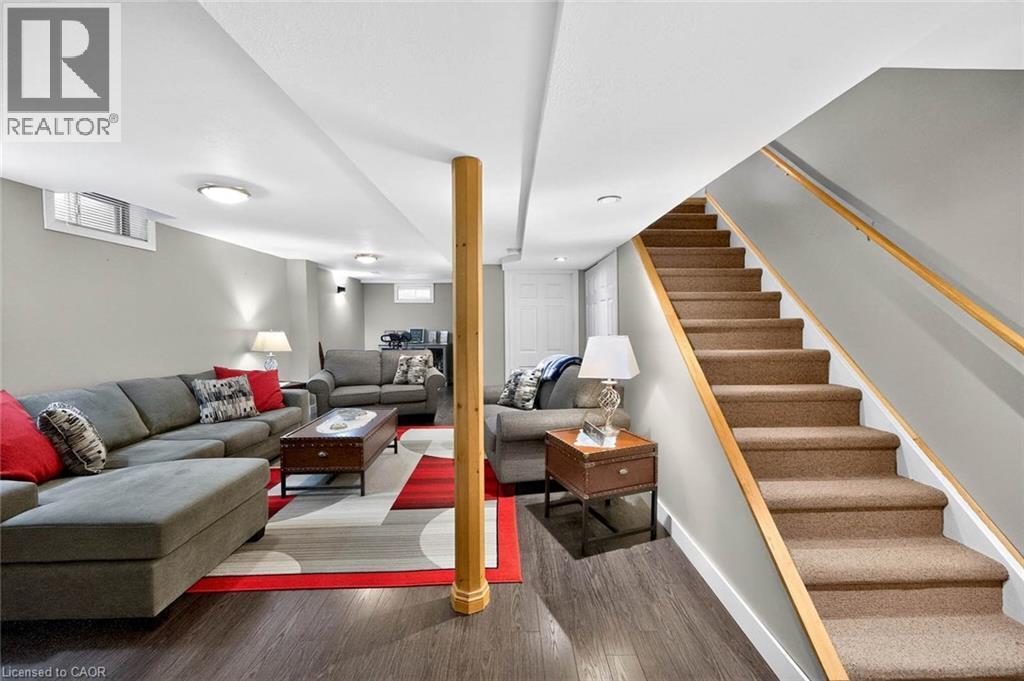 Living area with stairway and wood finished floors - 3753 Densbury Drive, Mississauga, ON - Indoor
