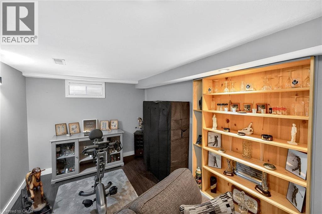 Home office featuring dark wood-style floors and baseboards - 3753 Densbury Drive, Mississauga, ON - Indoor