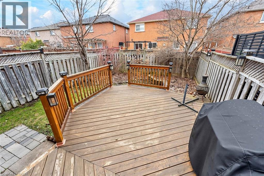 Wooden deck featuring a fenced backyard and a residential view - 3753 Densbury Drive, Mississauga, ON - Outdoor With Deck Patio Veranda With Exterior