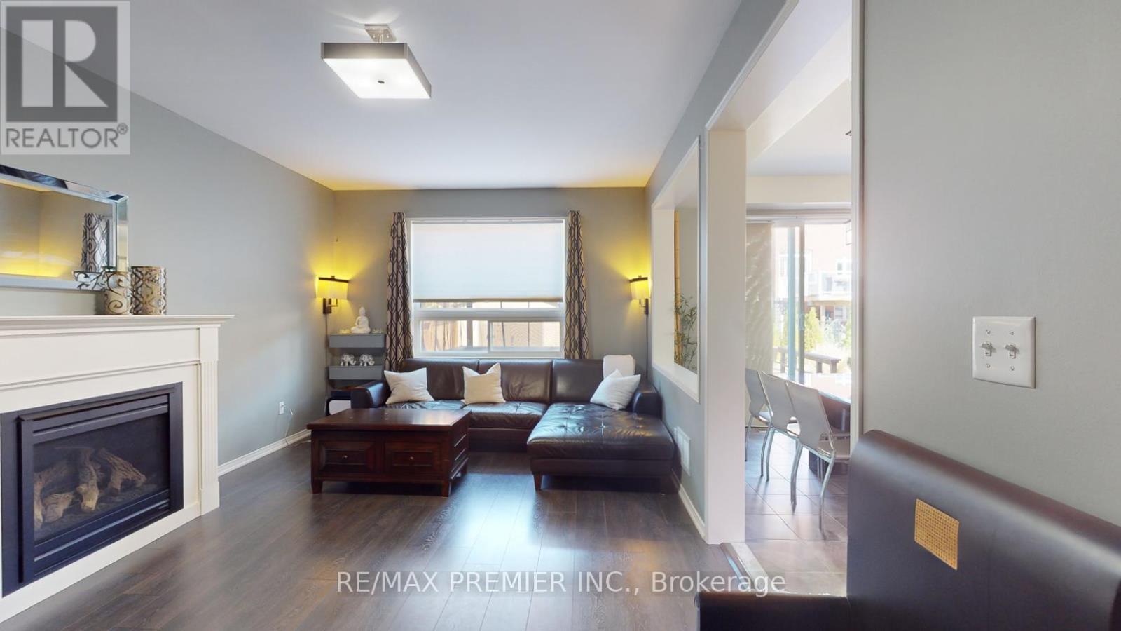 2307 Pilgrim Square, Oshawa, ON - Indoor Photo Showing Living Room With Fireplace