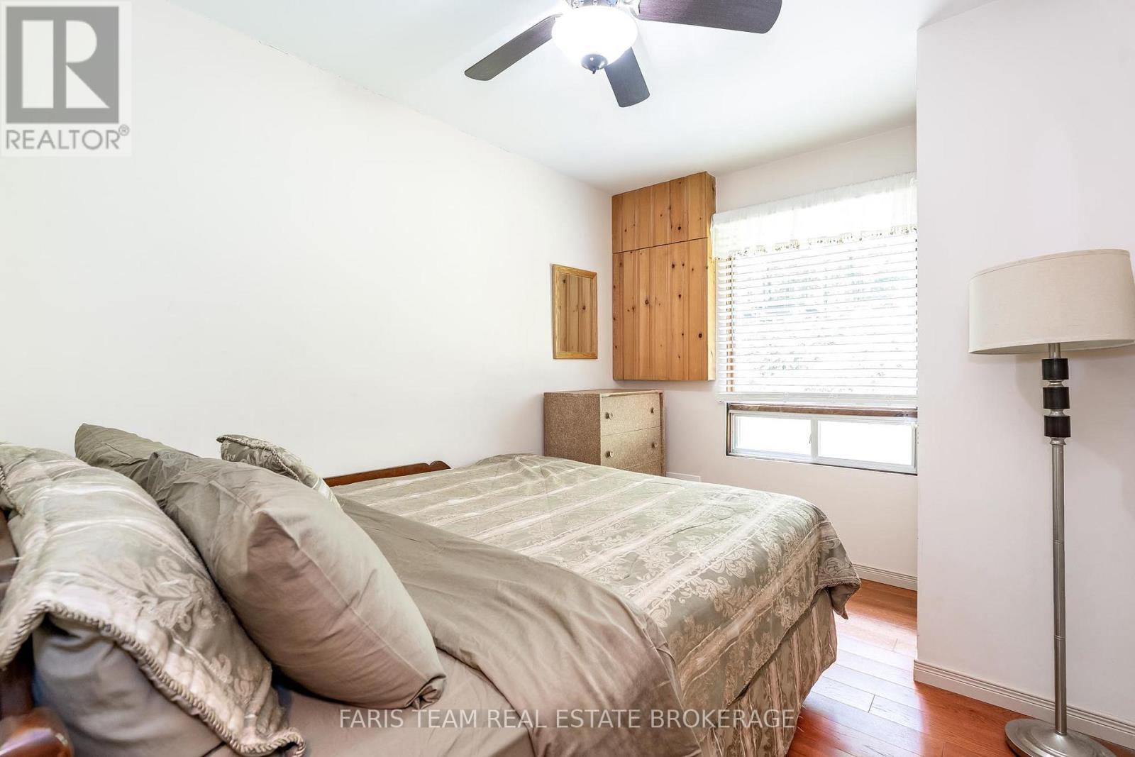 1697 Champlain Road, Tiny, ON - Indoor Photo Showing Bedroom