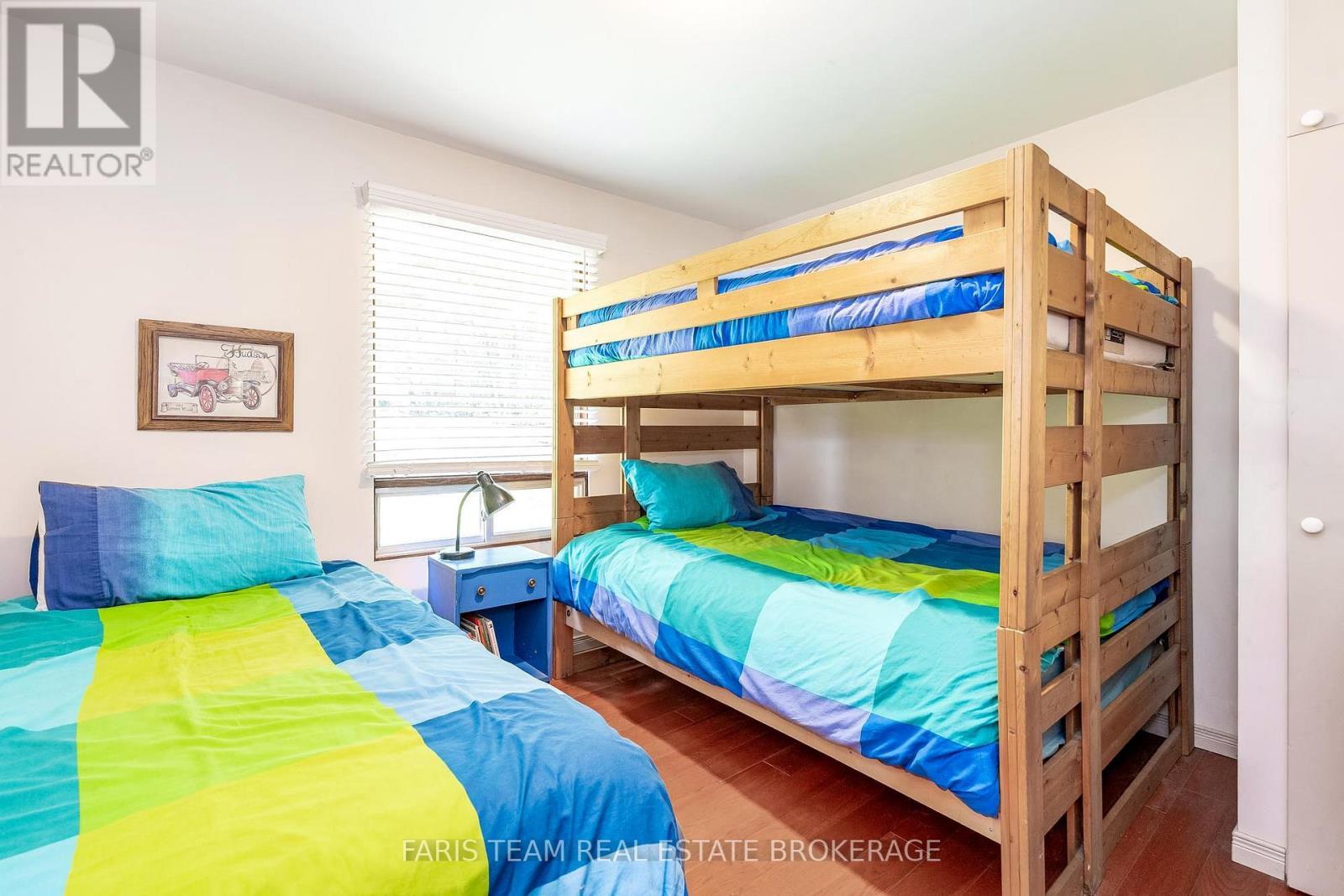 1697 Champlain Road, Tiny, ON - Indoor Photo Showing Bedroom