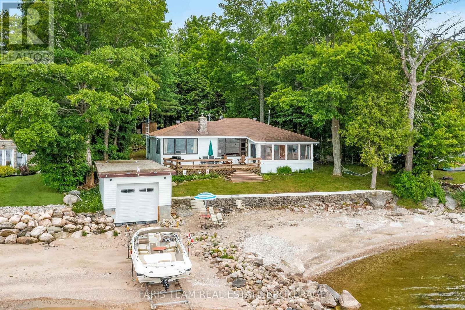 1697 Champlain Road, Tiny, ON - Outdoor With Body Of Water