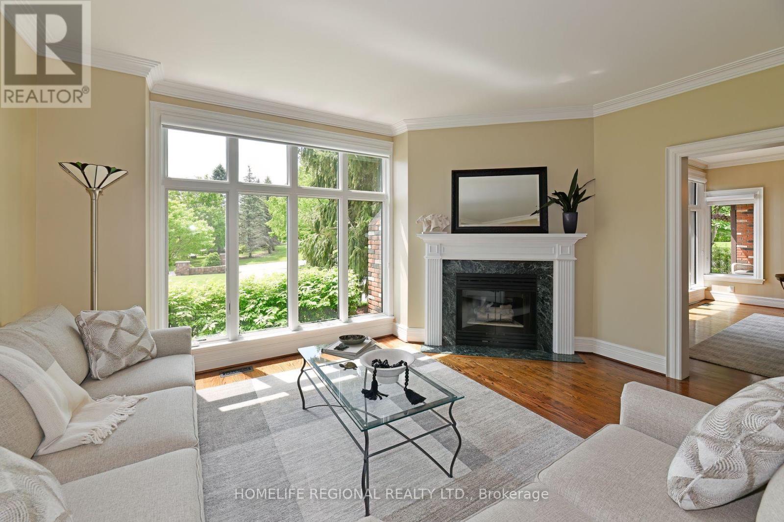 14 Buggey Lane, Ajax, ON - Indoor Photo Showing Living Room With Fireplace