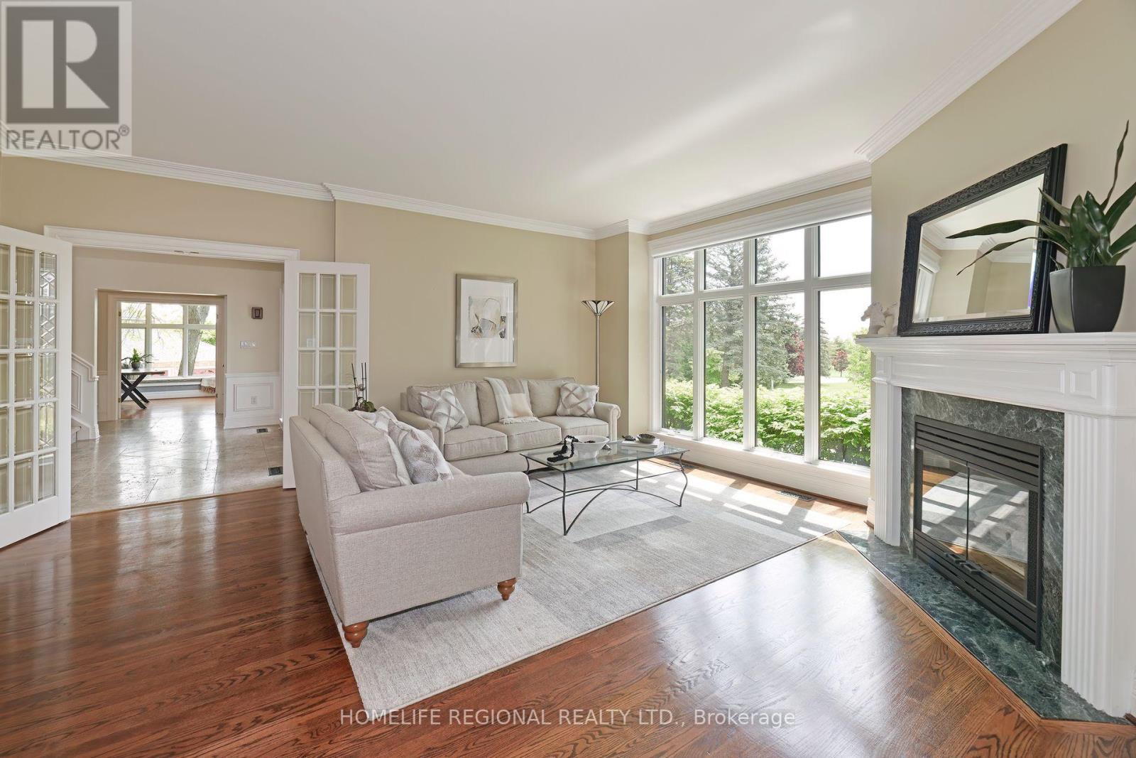 14 Buggey Lane, Ajax, ON - Indoor Photo Showing Living Room With Fireplace