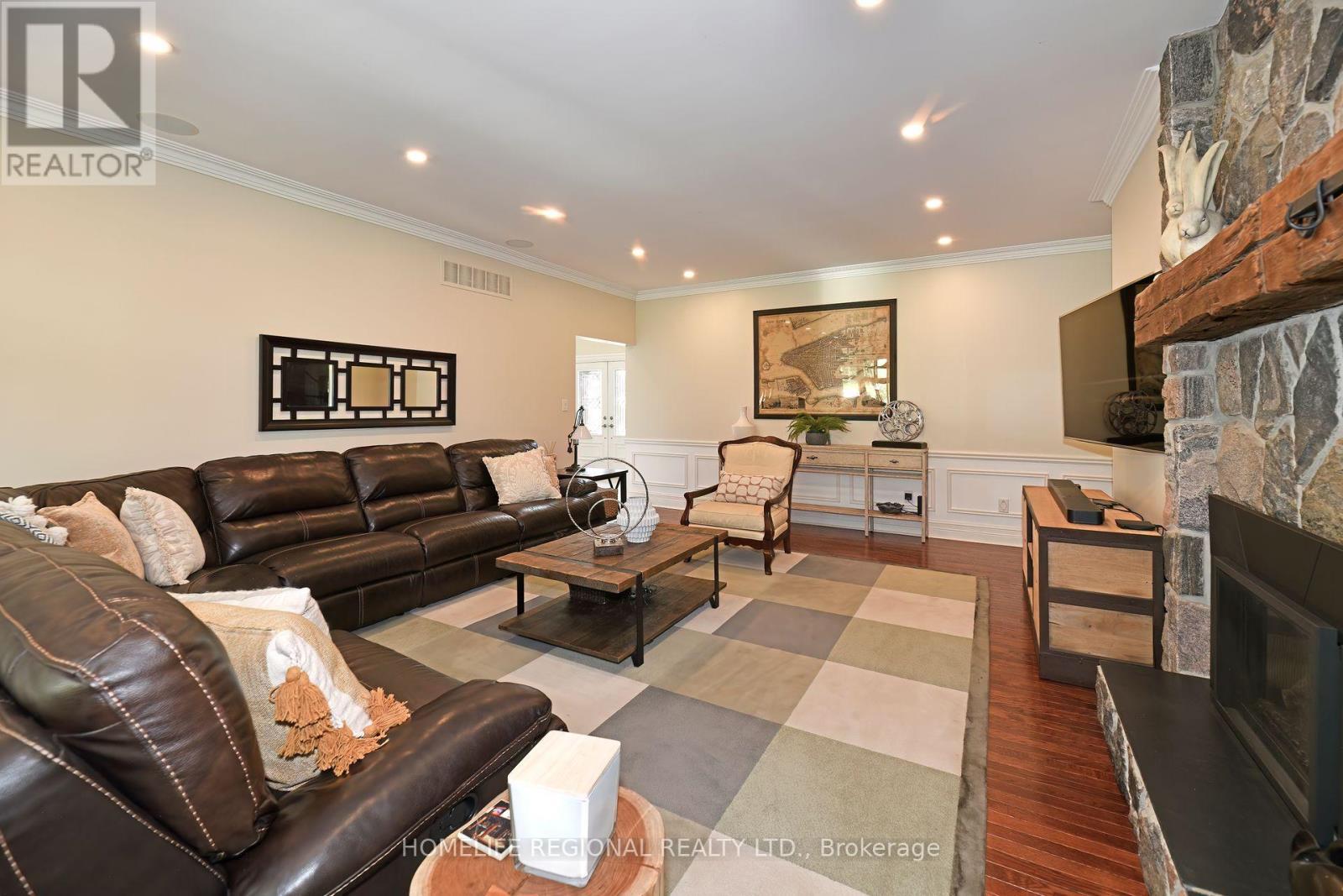 14 Buggey Lane, Ajax, ON - Indoor Photo Showing Living Room With Fireplace