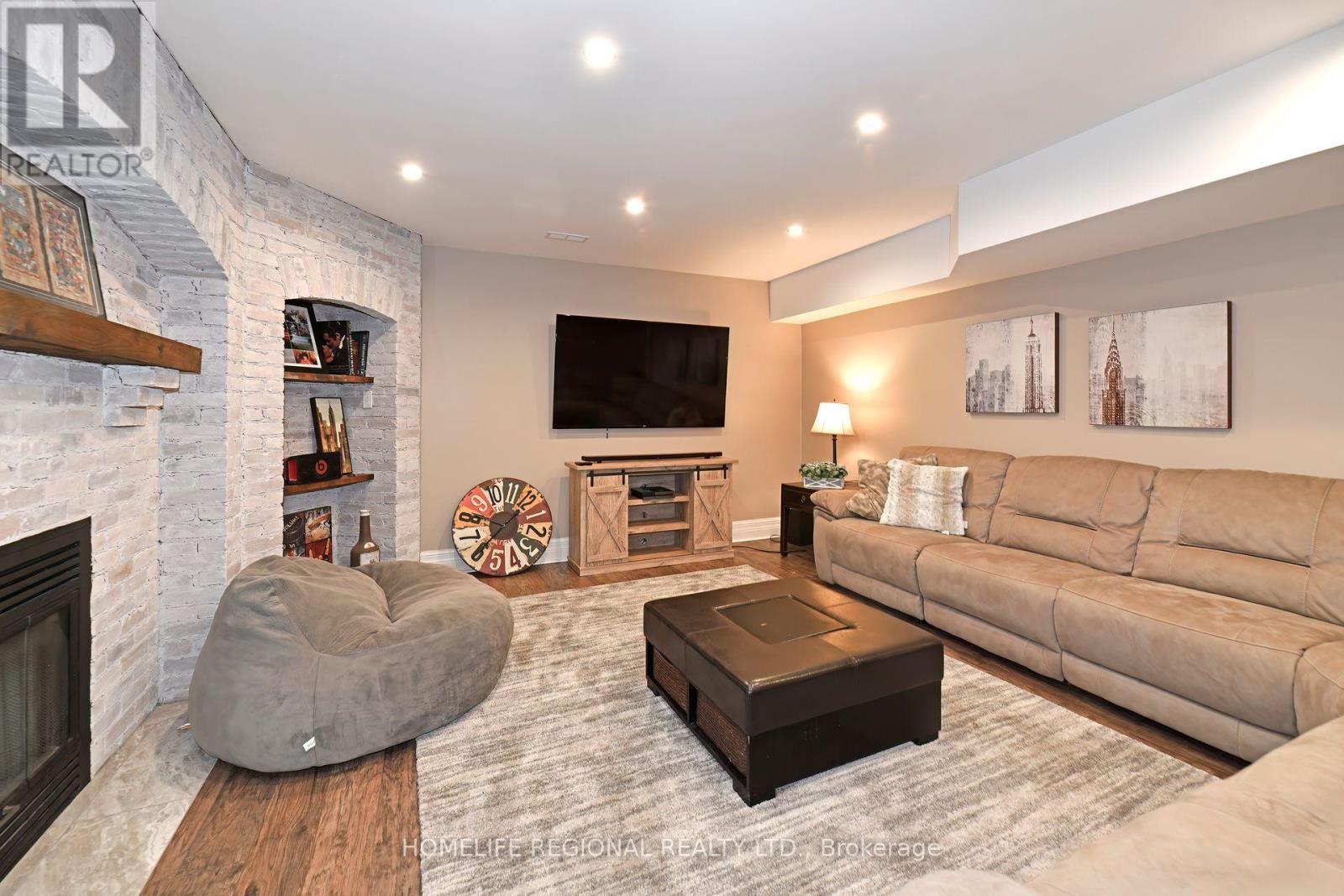 14 Buggey Lane, Ajax, ON - Indoor Photo Showing Living Room With Fireplace