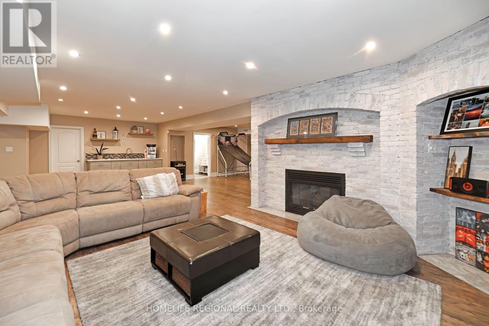 14 Buggey Lane, Ajax, ON - Indoor Photo Showing Living Room With Fireplace