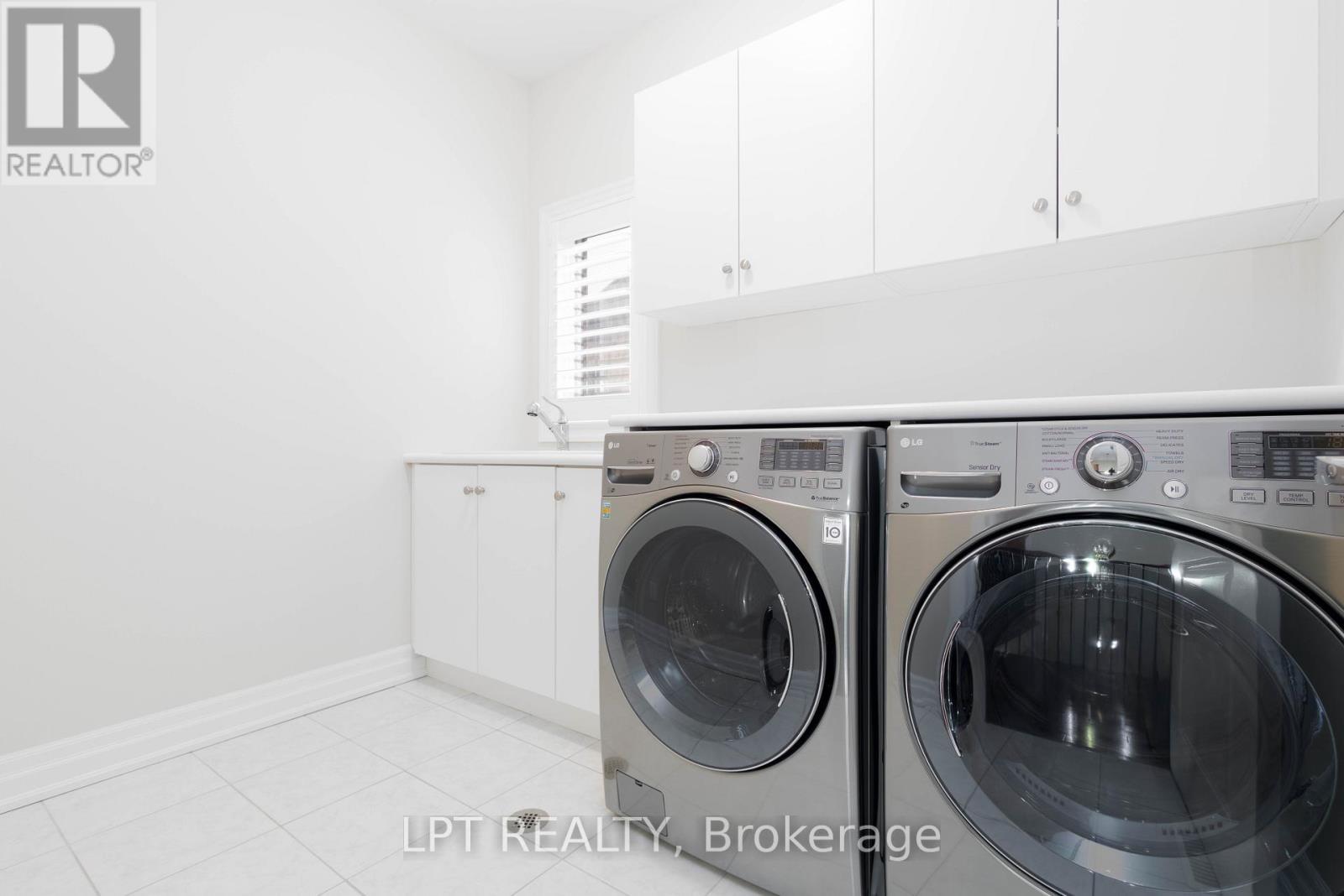 Convenient Upper Level Laundry - 113 Burns Boulevard, King, ON - Indoor Photo Showing Laundry Room