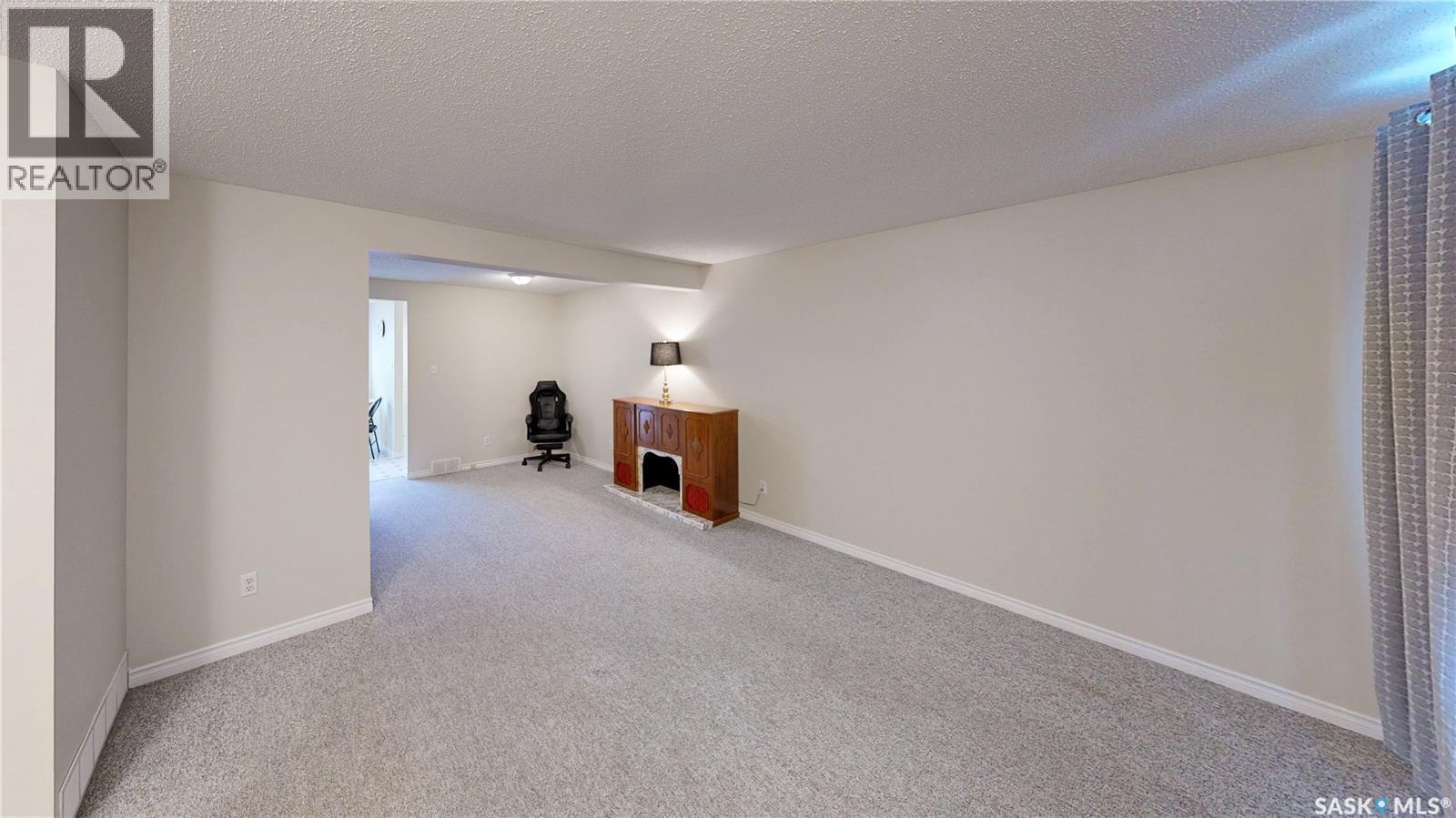 6 Mackenzie Mews, Regina, SK - Indoor Photo Showing Other Room