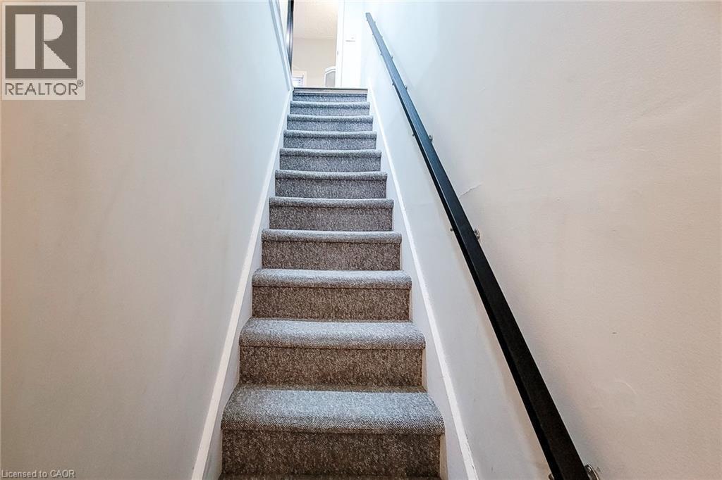 View of stairway - 97 Keith Street, Hamilton, ON - Indoor Photo Showing Other Room
