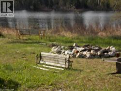 View of community with a water view -