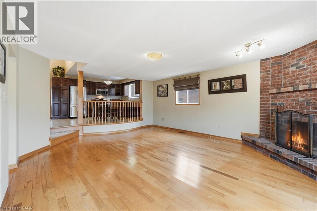 783 Stone Church Road E, Hamilton, ON - Indoor Photo Showing Other Room With Fireplace