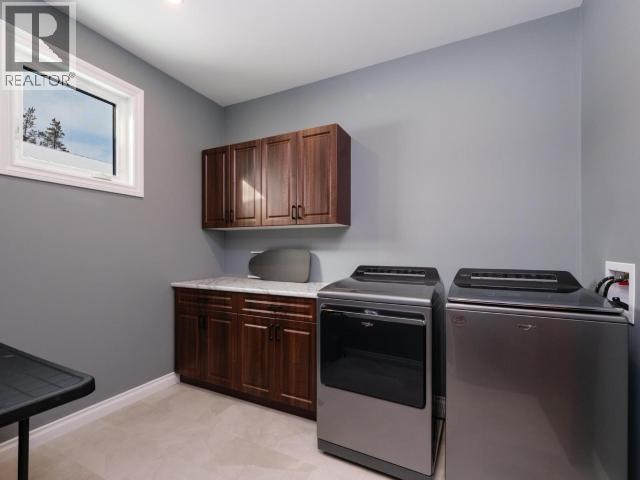 348 Dusty Trail, Whitehorse North, YT - Indoor Photo Showing Laundry Room