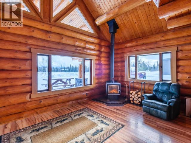 348 Dusty Trail, Whitehorse North, YT - Indoor Photo Showing Living Room With Fireplace