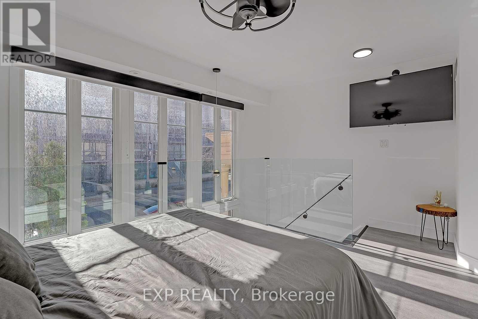 Remote Control Blinds - 1111 - 50 East Liberty Street, Toronto, ON - Indoor Photo Showing Bedroom