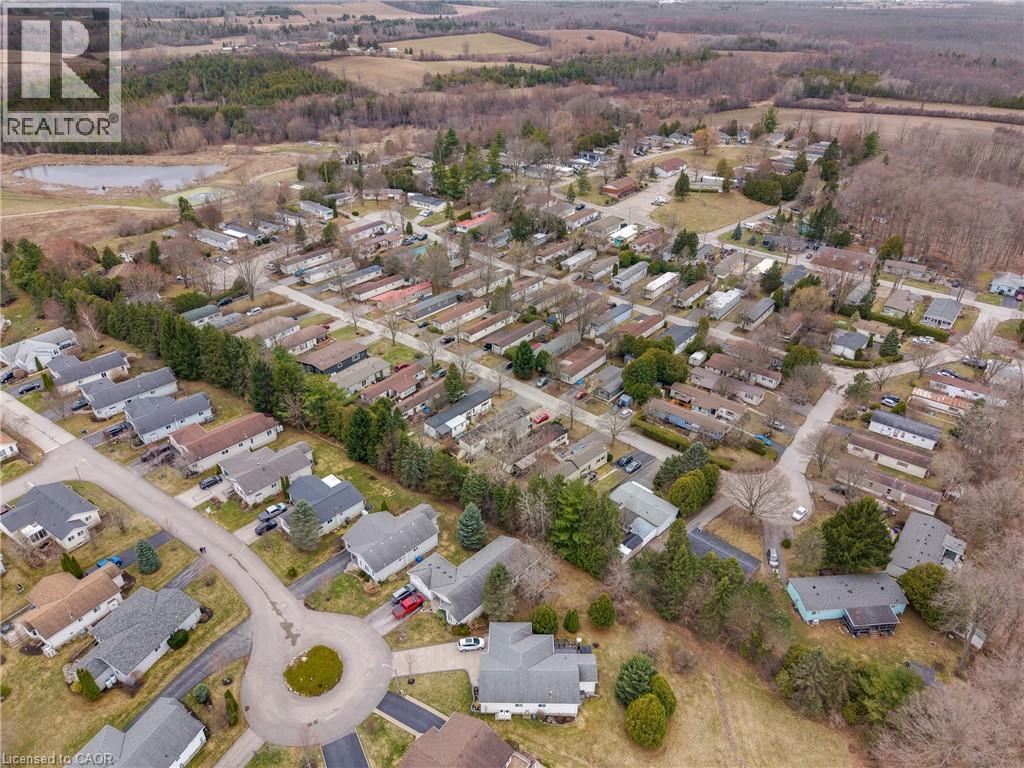 Aerial overview of property's location with nearby suburban area and a nearby body of water - 157 Maple Crescent, Hamilton, ON - Outdoor With View