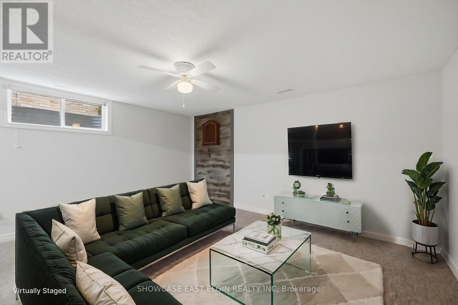 Recreation room is virtually staged - angle 2. - 2 Harrington Crescent, St. Thomas, ON - Indoor Photo Showing Living Room