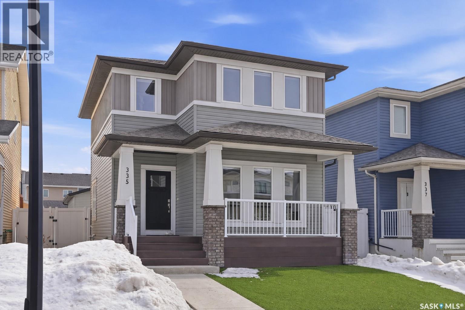 335 Secord Way, Saskatoon, SK - Outdoor With Deck Patio Veranda With Facade