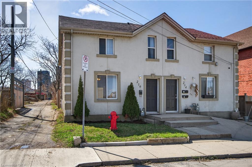View of front of property with stucco siding - 216 Robert Street, Hamilton, ON - Outdoor