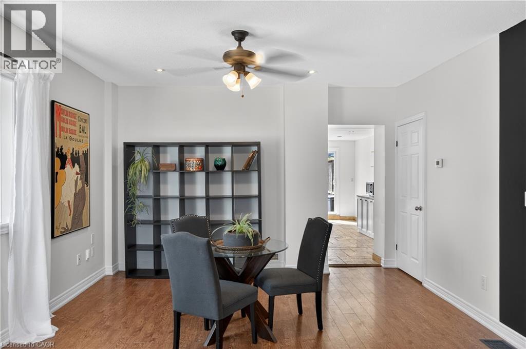 Dining space with a ceiling fan, hardwood / wood-style flooring, and recessed lighting - 216 Robert Street, Hamilton, ON - Indoor Photo Showing Dining Room