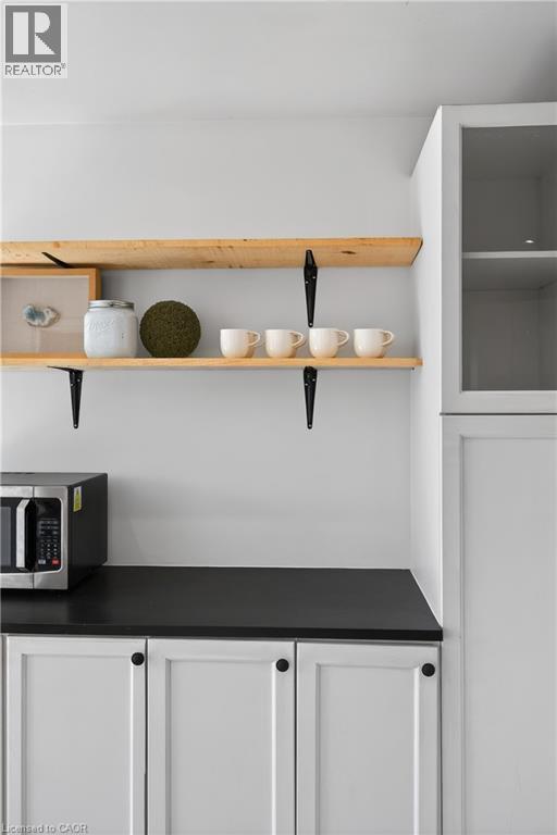 Detailed view of stainless steel microwave - 216 Robert Street, Hamilton, ON - Indoor