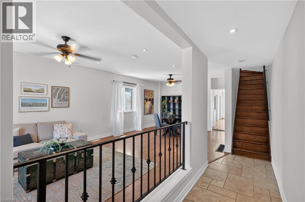 Corridor featuring stone tile floors and recessed lighting - 216 Robert Street, Hamilton, ON - Indoor Photo Showing Other Room