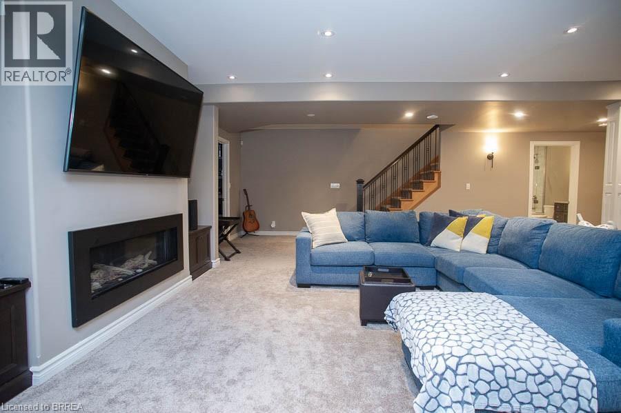 87 Allandale Crescent, Simcoe, ON - Indoor Photo Showing Living Room With Fireplace
