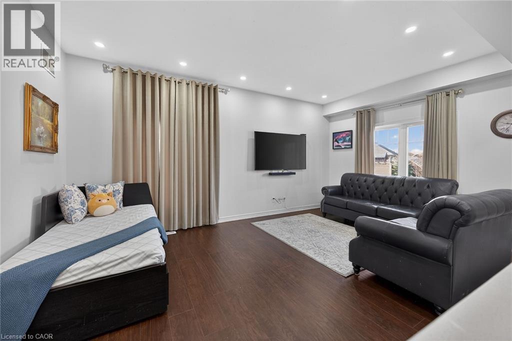 Living area with wood finished floors and recessed lighting - 80 Severino Circle, Smithville, ON - Indoor Photo Showing Living Room