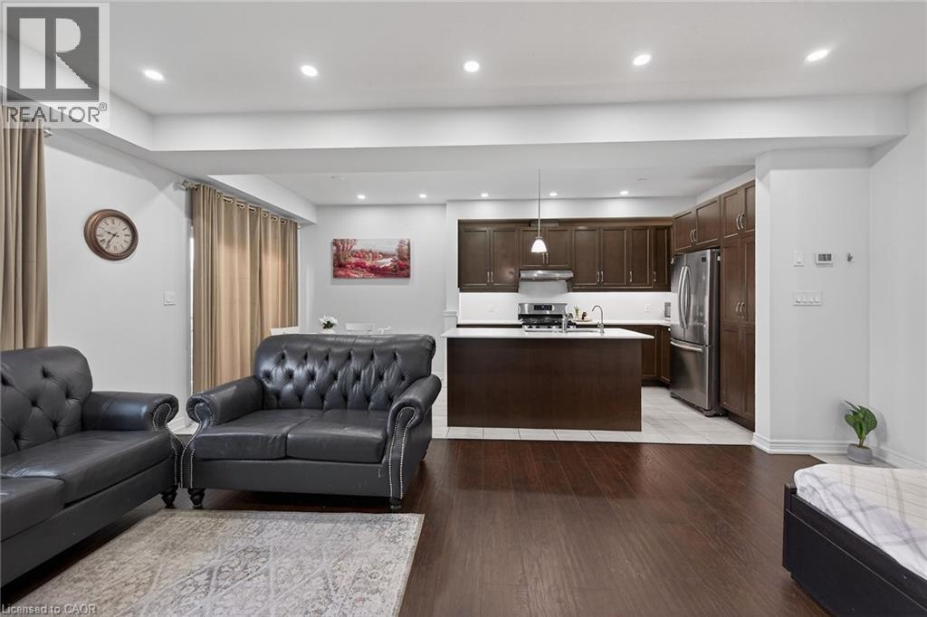 Living area featuring light wood-style floors and recessed lighting - 80 Severino Circle, Smithville, ON - Indoor Photo Showing Living Room
