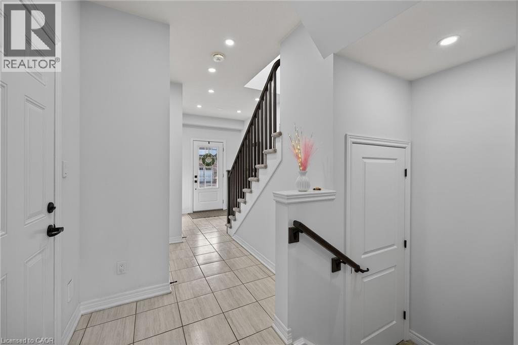 Entryway featuring recessed lighting and light tile patterned floors - 80 Severino Circle, Smithville, ON - Indoor Photo Showing Other Room