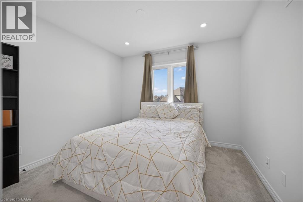 Carpeted bedroom featuring baseboards and recessed lighting - 80 Severino Circle, Smithville, ON - Indoor Photo Showing Bedroom
