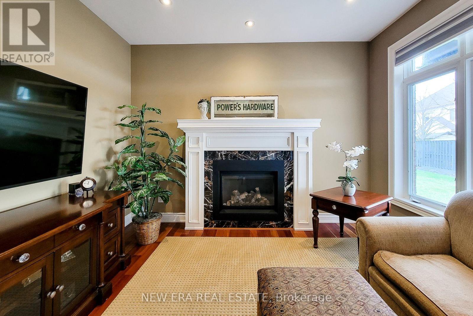 13 Alex Grant Place, St. Catharines, ON - Indoor Photo Showing Living Room With Fireplace