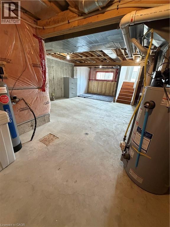 Below grade area featuring gas water heater and stairway - 45 Brookfield Crescent, Kitchener, ON - Indoor