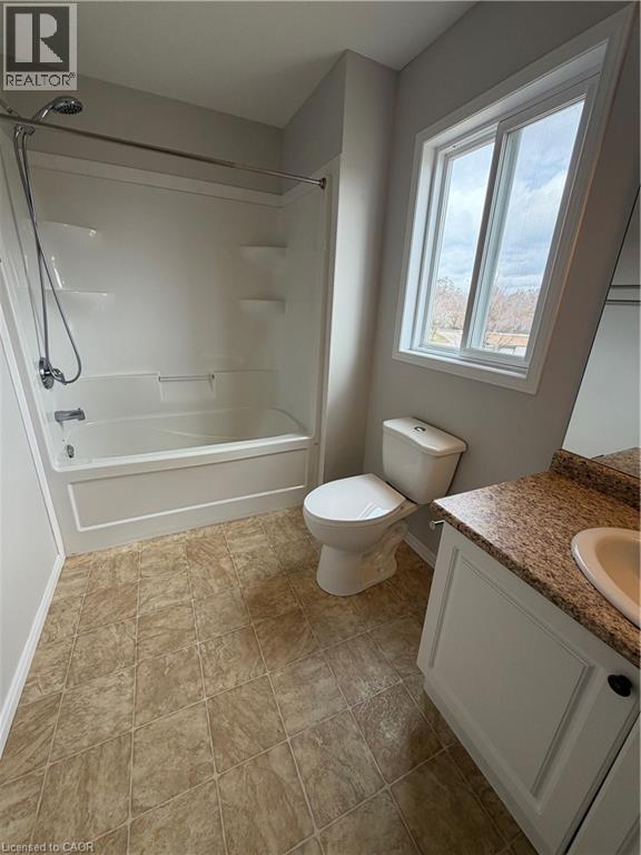 Full bathroom featuring vanity and washtub / shower combination - 45 Brookfield Crescent, Kitchener, ON - Indoor Photo Showing Bathroom
