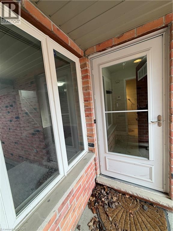 Exterior view of brick siding - 45 Brookfield Crescent, Kitchener, ON - Outdoor With Deck Patio Veranda With Exterior