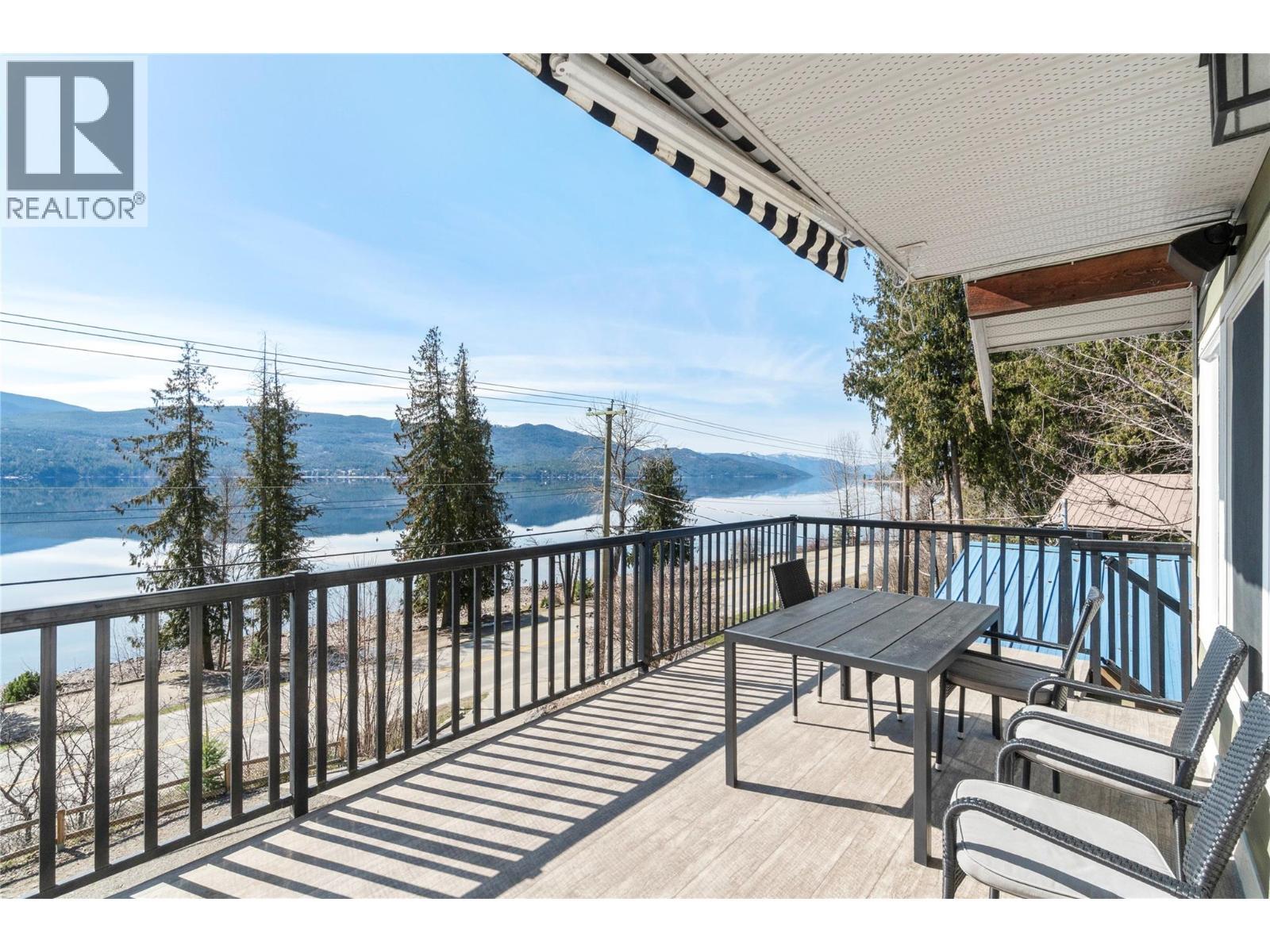7577 Squilax Anglemont Road, Anglemont, BC - Outdoor With Body Of Water With View With Exterior