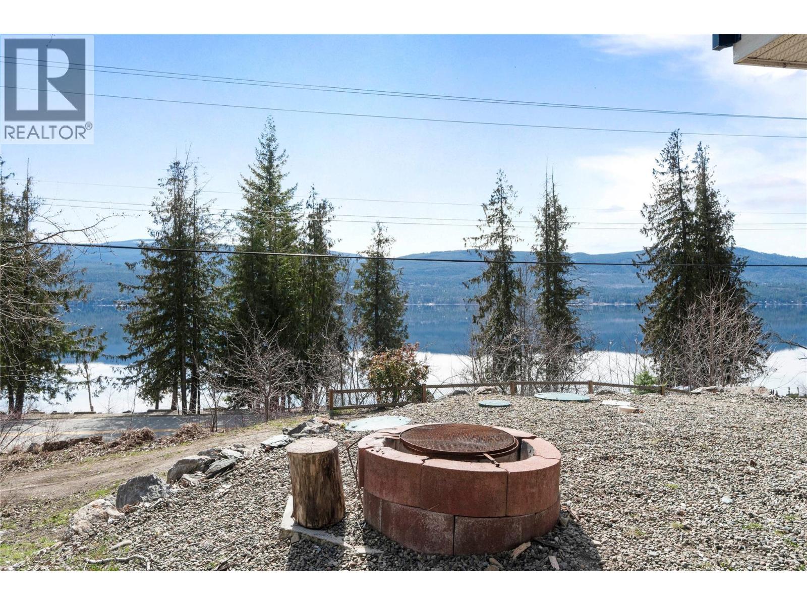 7577 Squilax Anglemont Road, Anglemont, BC - Outdoor With Body Of Water With View