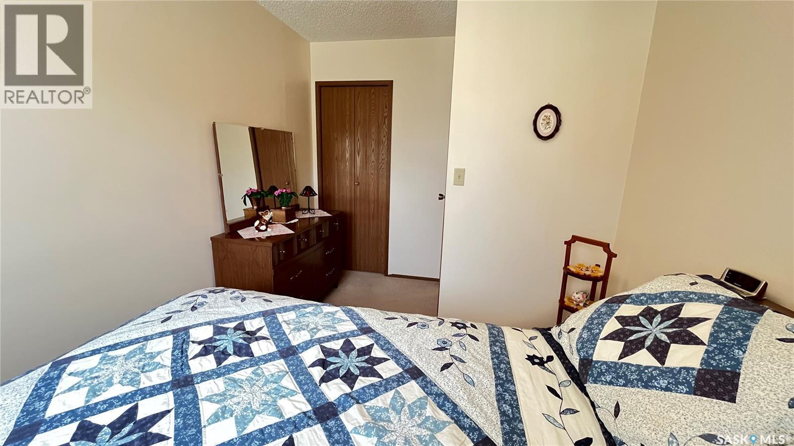 211 Maple Street, Maple Creek, SK - Indoor Photo Showing Bedroom