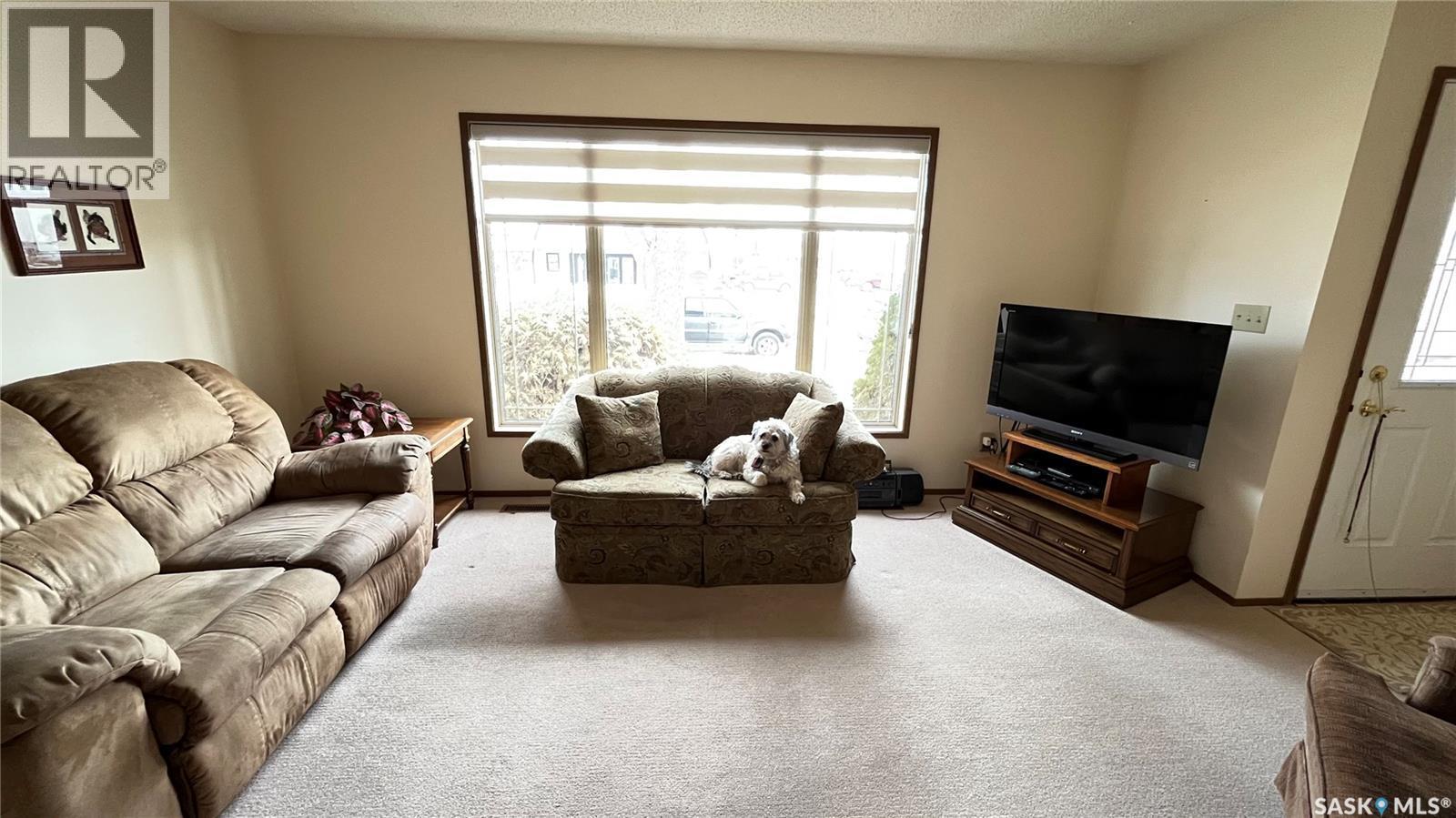 211 Maple Street, Maple Creek, SK - Indoor Photo Showing Living Room