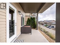 This corner unit has a fully fenced yard space and covered patio area -