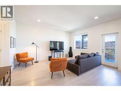Living room with door to covered deck -