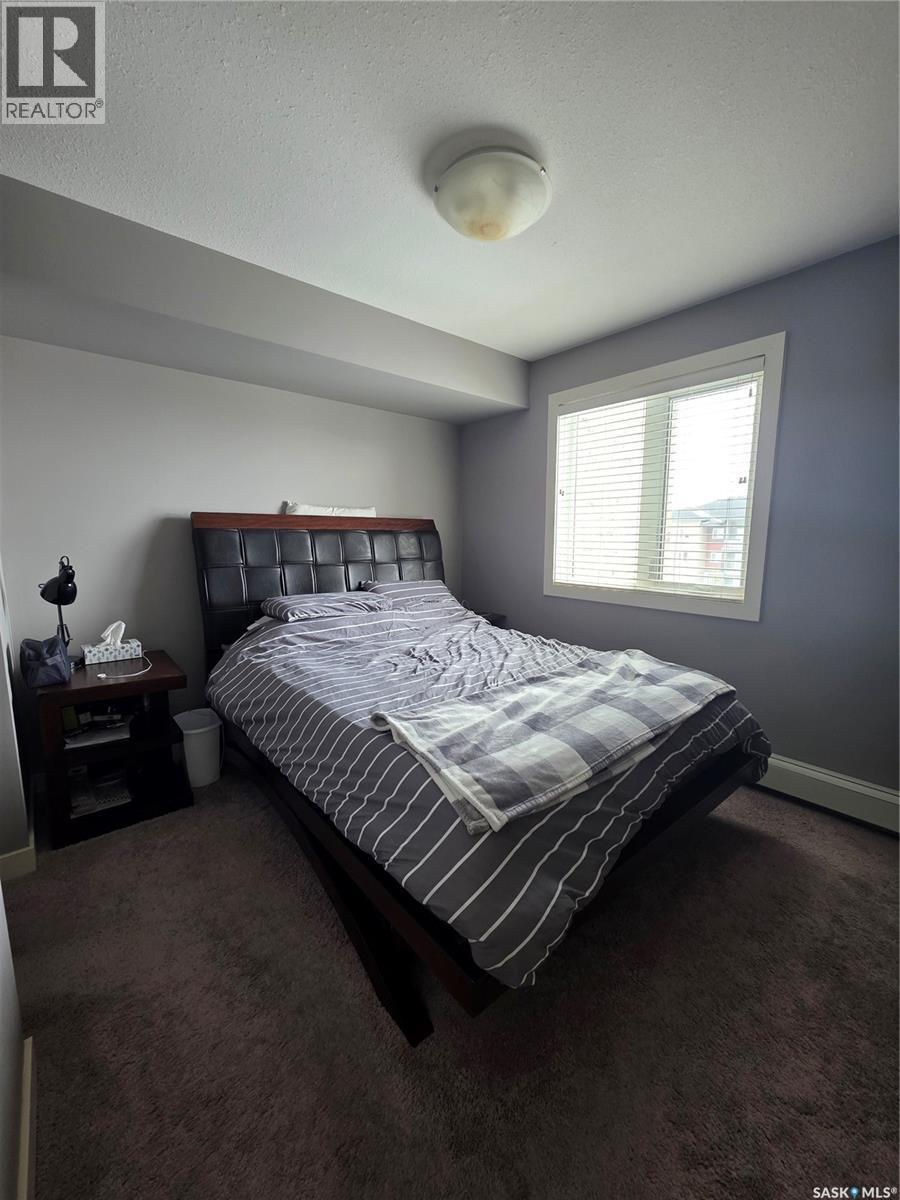 407 308 Petterson Drive, Estevan, SK - Indoor Photo Showing Bedroom