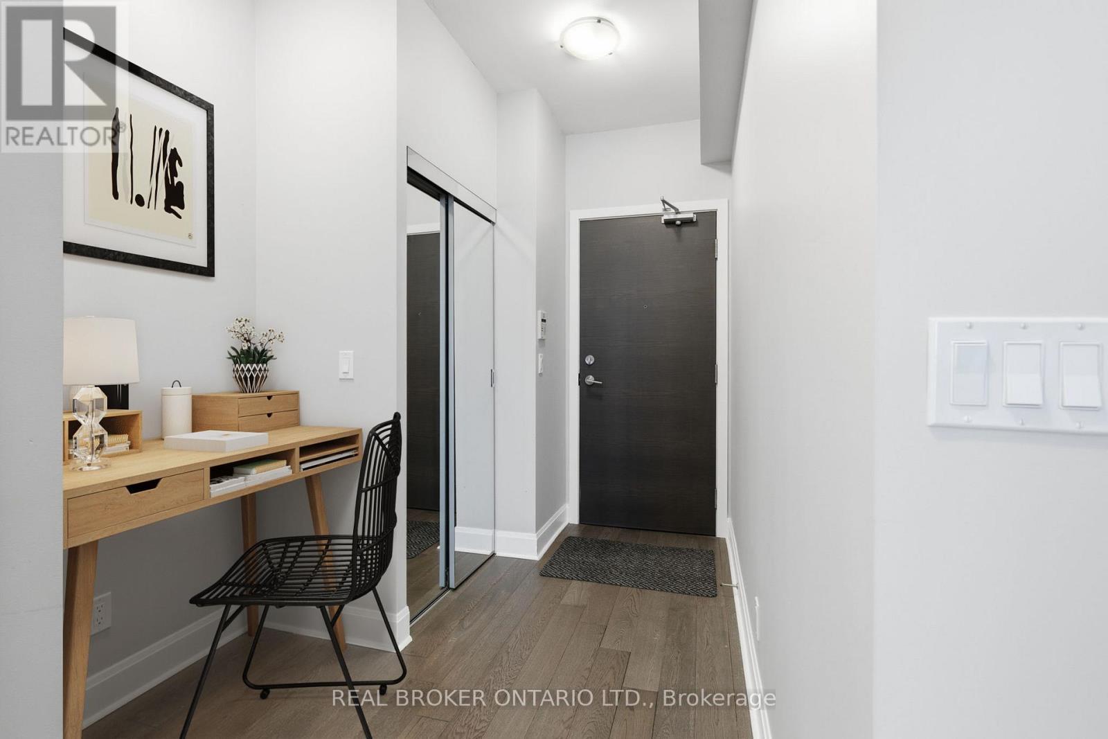 Office Alcove and Front Hallway - Virtually Staged - 1801 - 33 Shore Breeze Drive, Toronto, ON - Indoor Photo Showing Other Room