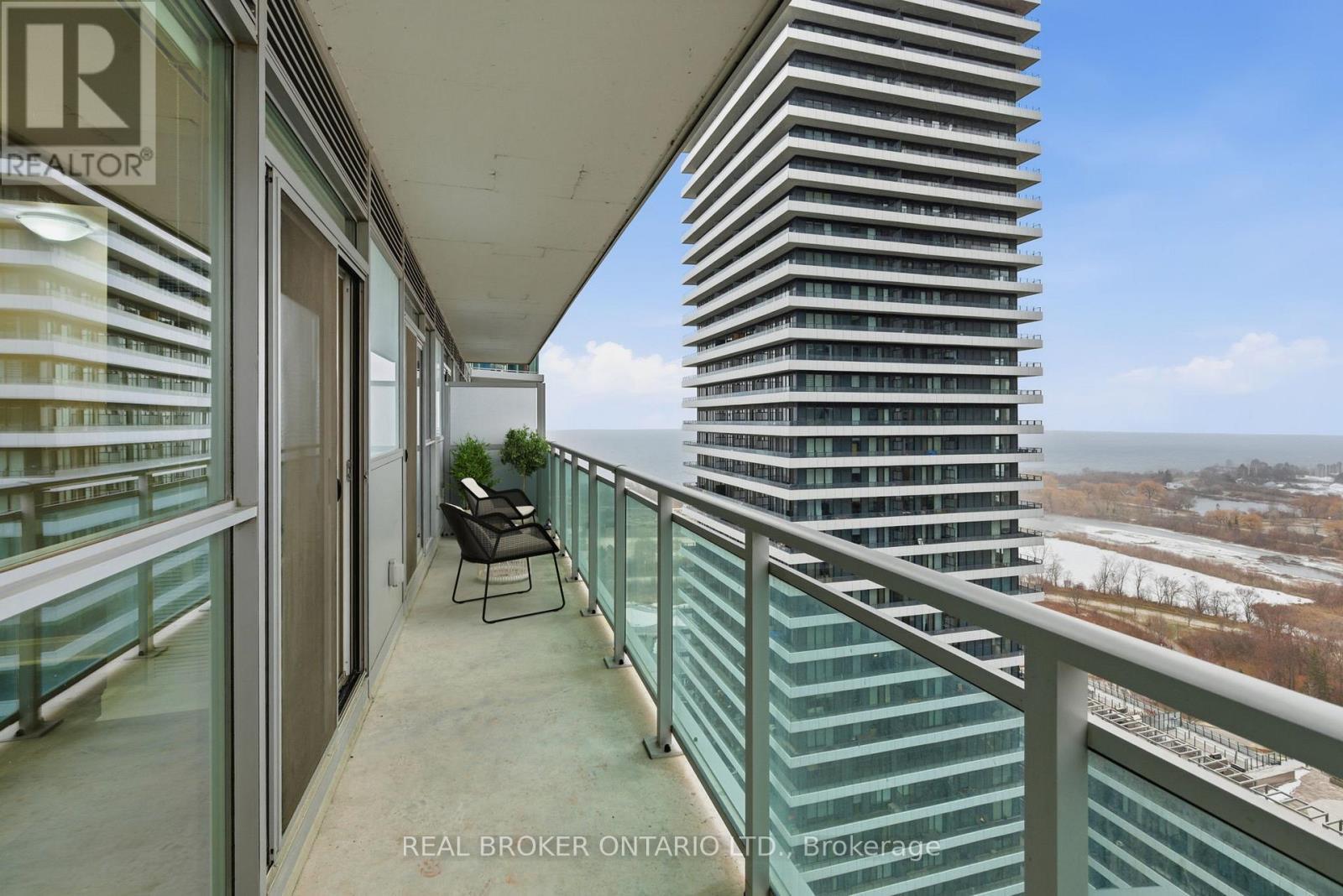 South West View from Balcony - Virtually Staged - 1801 - 33 Shore Breeze Drive, Toronto, ON - Outdoor With Balcony