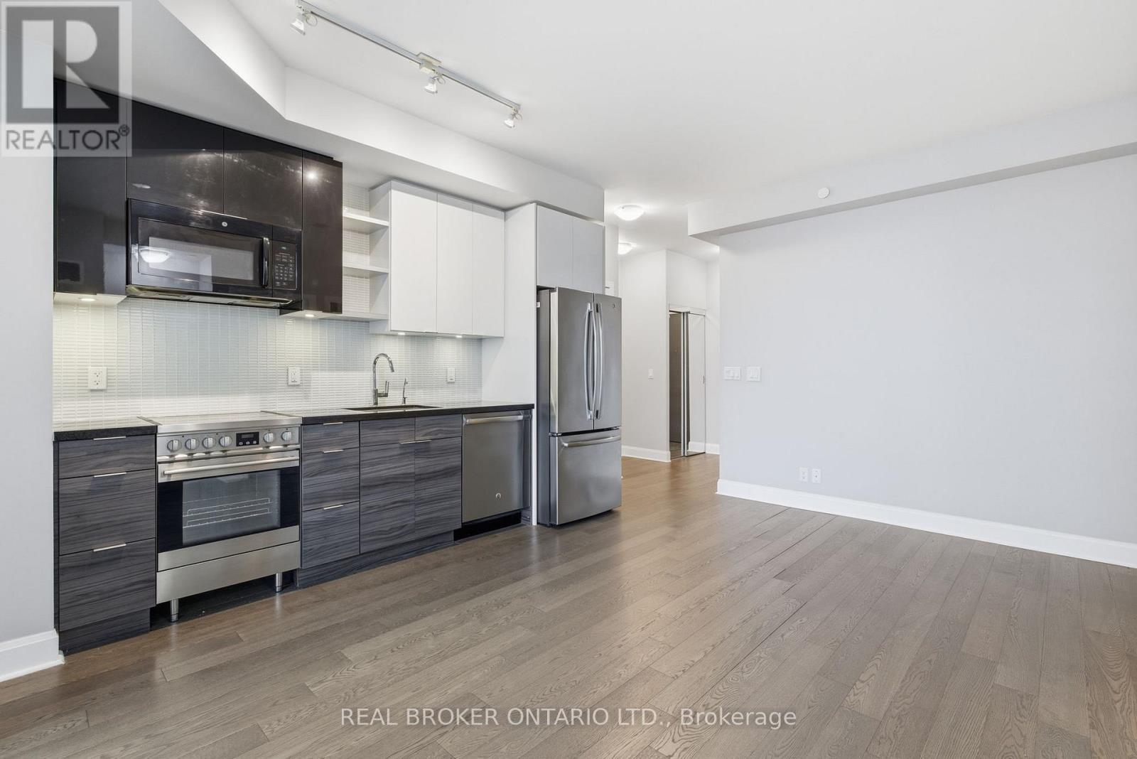 Open Concept with Contemporary Finishes - 1801 - 33 Shore Breeze Drive, Toronto, ON - Indoor Photo Showing Kitchen With Stainless Steel Kitchen With Upgraded Kitchen