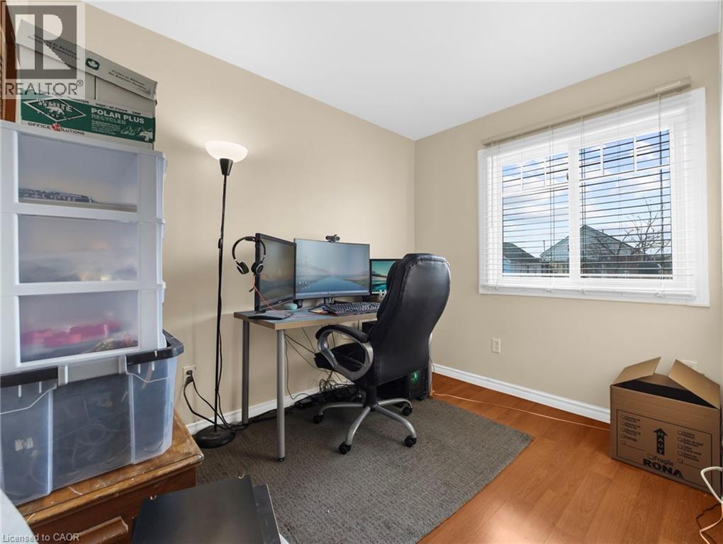Office space featuring wood finished floors and baseboards - 420 Waverly Street, Hamilton, ON - Indoor Photo Showing Other Room