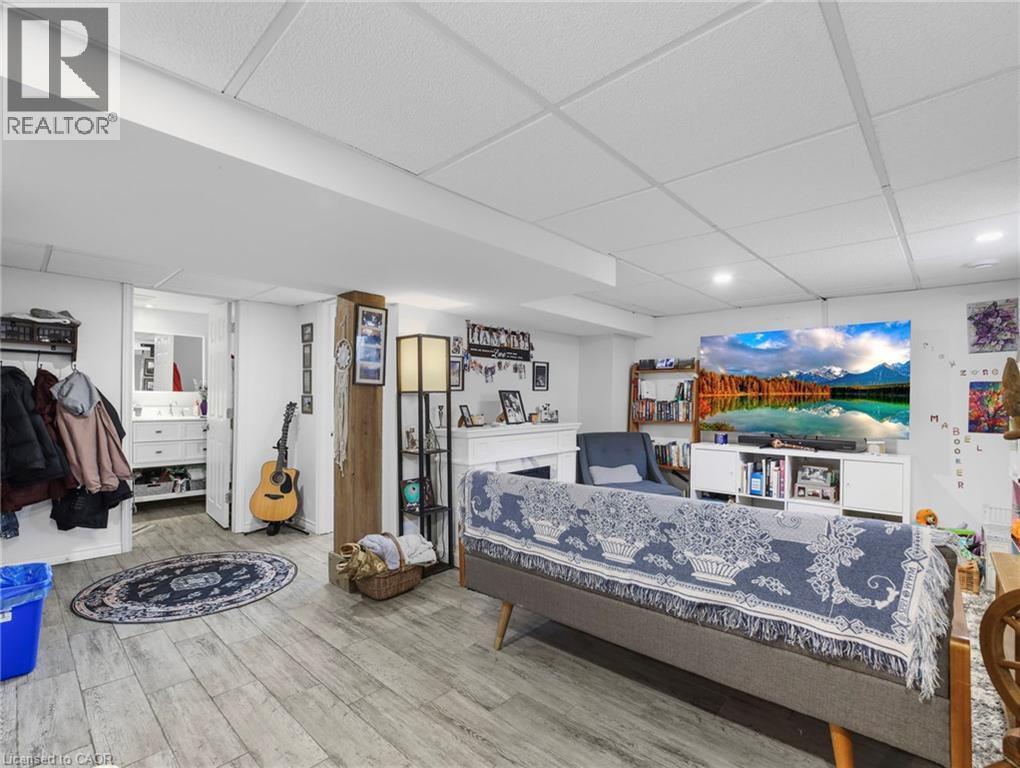 paneled ceiling and light wood-type flooring - 420 Waverly Street, Hamilton, ON - Indoor Photo Showing Other Room